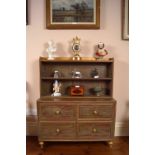 REGENCY PAINTED AND PARCEL GILT OPEN BOOKCASE