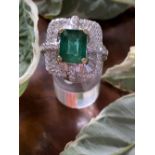 COLOMBIAN EMERALD AND DIAMOND CLUSTER RING