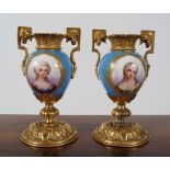 PAIR OF SEVRES AND ORMOLU URNS