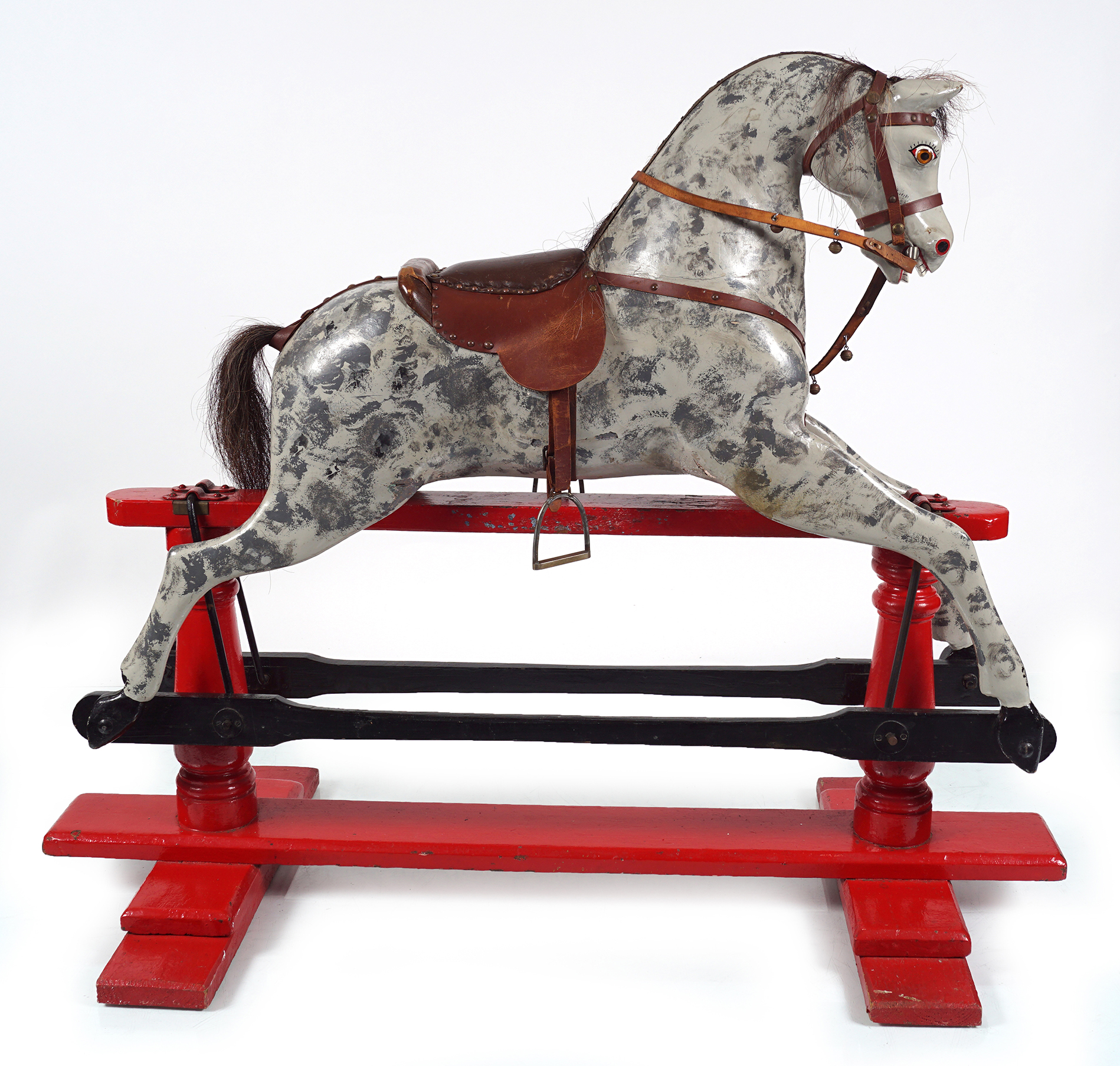 ANTIQUE POLYCHROME WOODEN ROCKING HORSE
