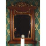 EMPIRE STYLE MAHOGANY AND PARCEL GILT PIER MIRROR