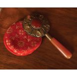 GILDED BRASS AND PIETRA DURA CASED VANITY MIRROR