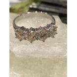 18CT WHITE GOLD FOUR STONE DIAMOND RING