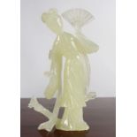 CHINESE CELADON JADE FIGURE OF A WOMAN