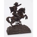 19TH-CENTURY METAL CAVALIER ON HORSEBACK