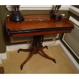 EDWARDIAN ROSEWOOD AND MARQUETRY GAMES TABLE