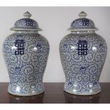 PAIR OF LARGE CHINESE BLUE AND WHITE URNS