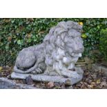 PAIR OF ESTATE LIFESIZE COMPOSITE STONE LIONS