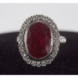 18 CT WHITE GOLD, RUBY AND DIAMOND RING