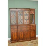 GEORGE III STYLE MAHOGANY BREAKFRONT BOOKCASE