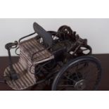 VINTAGE MODEL OF A 3 WHEELED MOTORCYCLE