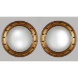 PAIR OF EDWARDIAN GILT FRAMED CONVEX MIRRORS