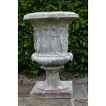 PAIR OF MOULDED STONE GARDEN URNS