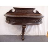 19thC carved oak demi-lune hall table on serpentine pedestal leg (40"w x 28"h x 15"d)