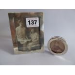 Rectangular and circular silver photograph frames (4" x 3.