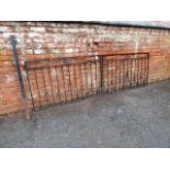 Pair of wrought iron driveway gates ( 58" wide x 36" high each )and a metal post