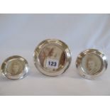 Matched set of 3 circular silver photograph frames (2.