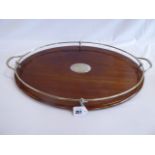 Early 20thC oval mahogany drinks tray with silver plated rail handles