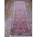 Red ground full pile Iranian all over floral pattern runner (2.