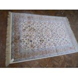 Ivory ground Kashmir all over flora pattern rug (1.7m x1.