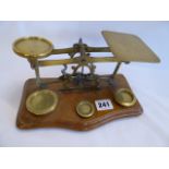 19thC brass postal scales on mahogany base