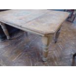 Victorian dining table on fluted legs (stripped)