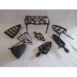 19th/20thC cast iron trivets and a charcoal iron (8)