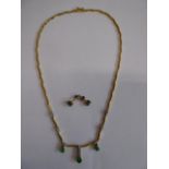 Yellow metal diamond and emerald necklace and pair emerald earrings - total 15.