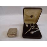 Silver pill box and cased silver sewing kit (2)