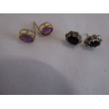 Pair of 9ct gold and jet earrings and a pair of yellow metal amethyst earrings