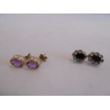 Pair of 9ct gold and jet earrings and a pair of yellow metal amethyst earrings