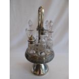 Plated revolving condiment stand with six etched glass bottles