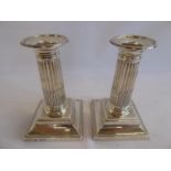 Pair of silver corinthian candlesticks - London 1898 (5" tall)