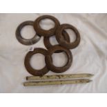 Set 6 iron quoits- stamped Wynn & Timmins 5lb and a pair of iron posts