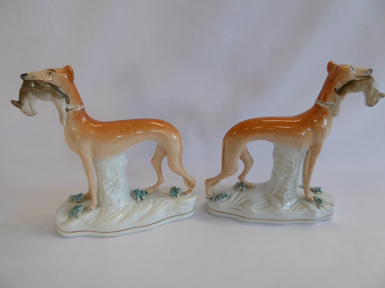 Pair 19thC Staffordshire coursing hound and hare figures