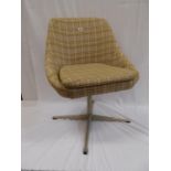 Mid 20thC upholstered swivel chair