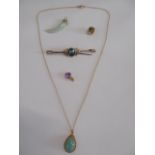 9ct gold teardrop jade pendant on 9ct gold chain, 9ct gold blue stone brooch,