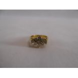 Gold ? cluster ring set with 9 diamonds (stamped 750) (4g)