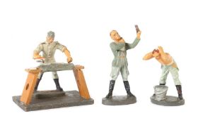 3 Figuren aus dem Lagerleben Elastolin, Masse, 7,5-cm-Serie, ca. 1937-39, 1 Soldat, sich am Eimer
