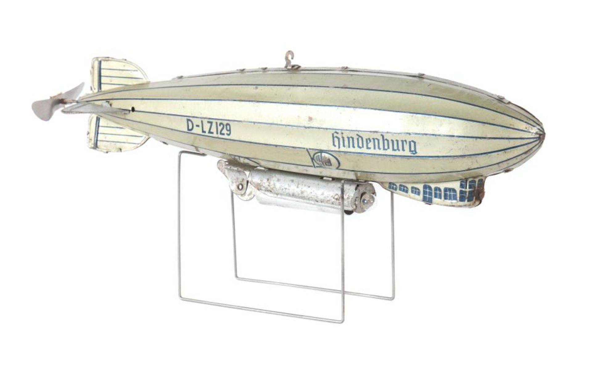 Zeppelin Tipp & Co, ca. 1935, Blech, Uhrwerkantrieb, bez.: "D-LZ129 Hindenburg", Gondel und