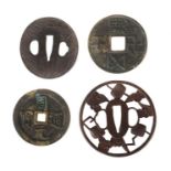 2 Tsuba und 2 Münzen Japan/China, w. 19. Jh., Eisen/Bronze, u.a. durchbrochen gearbeitet, Tsuba je