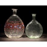 2 Schnapsflaschen Alpenländisch, 1. Hälfte 19. Jh., farbloses, gemodeltes, z.T. blasiges Glas mit
