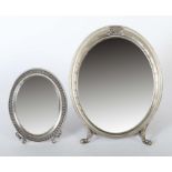 2 variierende Stellspiegel 20. Jh., Silber 800/Spiegelglas/Holz, ovale Spiegel mit fassonierten