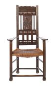 Worpsweder Stuhl Anfang 20. Jh., Eiche, verstrebte Pfostenbeine mit Füßen, Sitzfläche mit