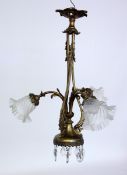 A HANGING LAMP circa 1900 Gilt bronze frame with 3 colourless, matt-etched glass shades.