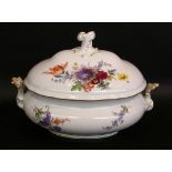 A TUREEN WITH COVER Meissen, 20th century Painted with ''Deutsche Blume''. 36.5 cm long.