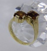 A LADIES RING 585/000 yellow gold with 2 Madeira citrines. Ring size 56, gross weight 4.6