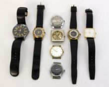 A LOT OF 8 GENTLEMAN'S WRISTWATCHES 4 with and 4 without strap. Function not tested.