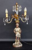 A BLACKAMOOR CANDELABRUM Wood, carved, painted in colour and gold decoration. 4-light