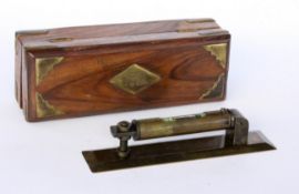 A SPIRIT LEVEL WITH RULER Stanley, London 1872 Small spirit level made of patinated brass